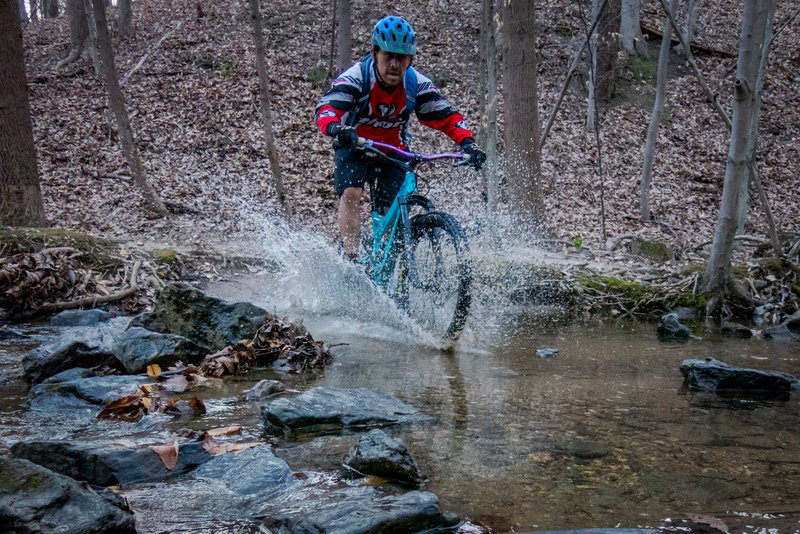 Walter splashing through the water after riding down Silverwood Trail.