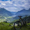 Looking forward to the descent into Poschiavo with Lago di Poschiavo in the background.