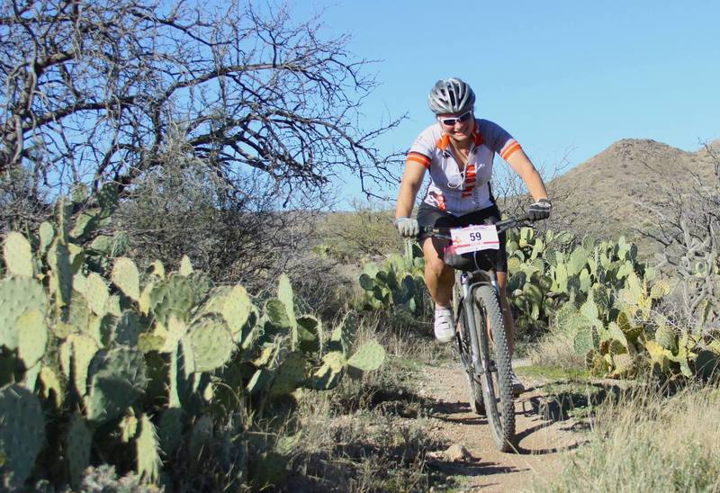 Smiling on her way to a 2nd Place Solo Womens finish - 2016 24HOP.