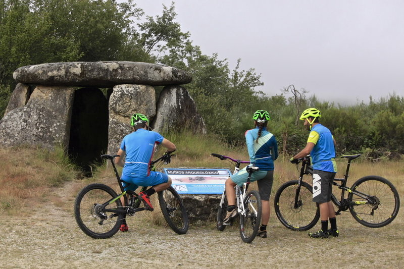 A "dolmen" - a prehistoric megalithic tomb - that dates back to 3,500 -3,000 BCE alongside the "Megalithic Trail": 1 of the 9 MTB trails of the Serra do Xurés MTB Trail Center close to Celanova in Ourense, Galicia, SPAIN.