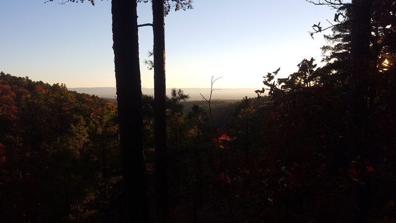 A peaceful sunset greets night-riders on the climb up Old Military Trail.