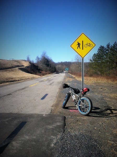 Look for this sign to know you are at the north end (Mitki Power Plant) of the Corridor H Bike Path. Roadside parking is available on the old Route 93 (closed).