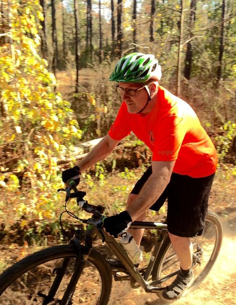 Johnny Smith, Mount Zion Bike Trails creator / designer, takes a early ride on the newly constructed Knott Head Loop.