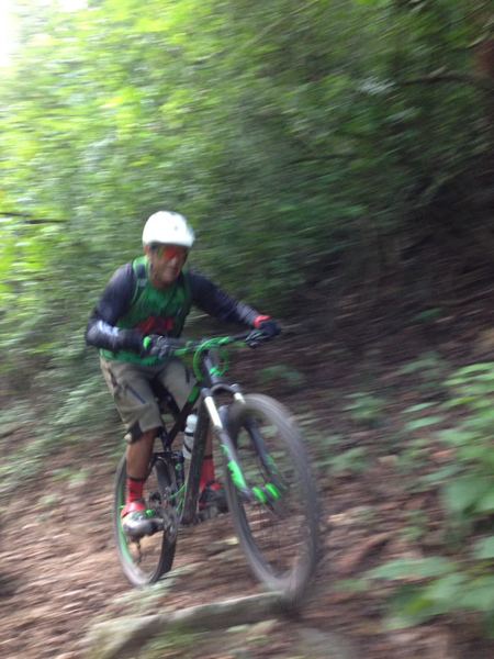 A rider floats over the raw stuff on the La Virgencita Descent.