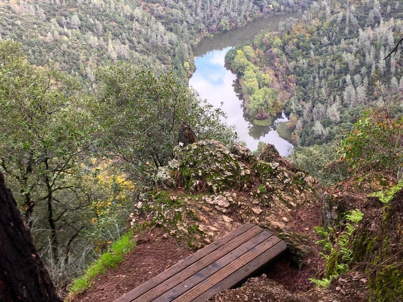 Rest stop bench with a great view at the top of the climb on Connector Trail.