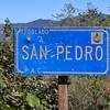 This hard-to-see little sign is all that indicates you've reached San Pedro. It is located about 150m beyond the restaurant at the summit.