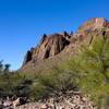 Distant rock towers decorate the backdrop in the Kofa Queen Canyon.