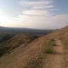 Descend the Regional Park Trail.  The trail is a steeper grade than the road and it is singletrack.