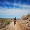 A rider enjoys the view along the Dynamite Trail.