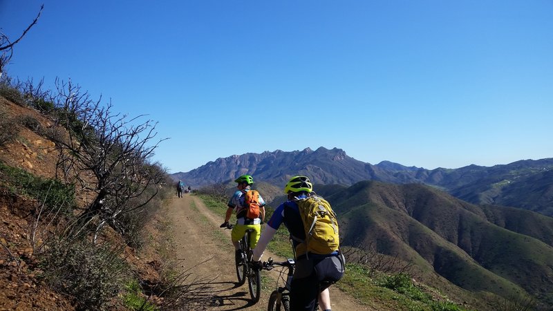 A group enjoys their climb in Point Mugu State Park.