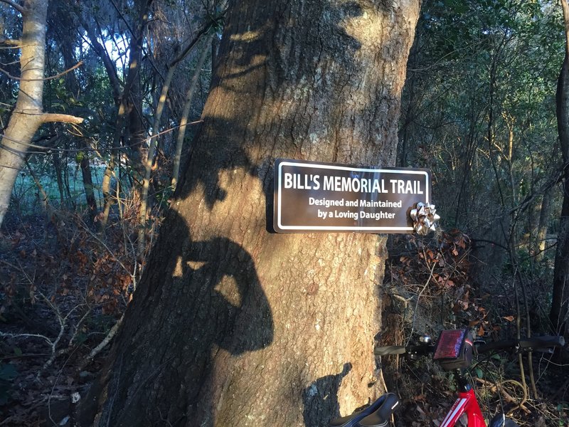 This trail dedication sign alerts all riders to the significance of this trail.