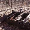 This old Model A chassis rusts alongside the trail - an old car is a requirement on southern Appalachian trails.