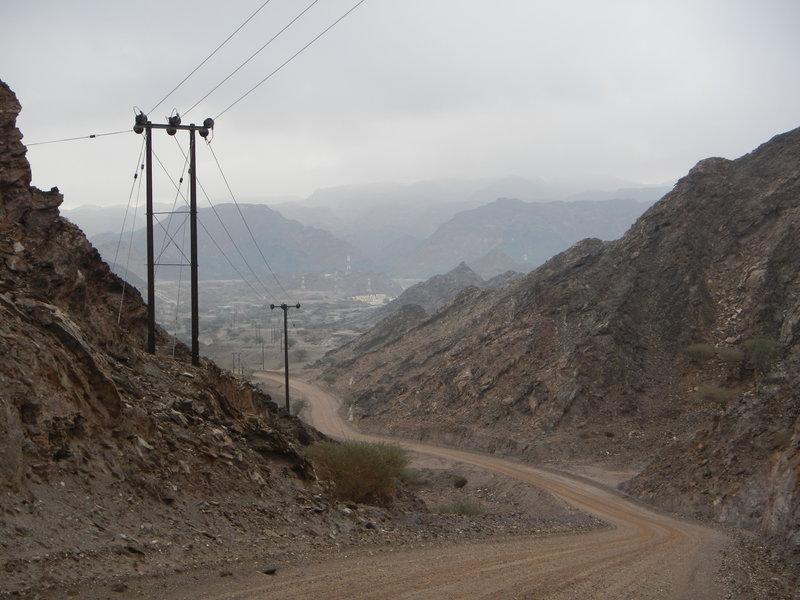 The road heads down into one of the village areas..