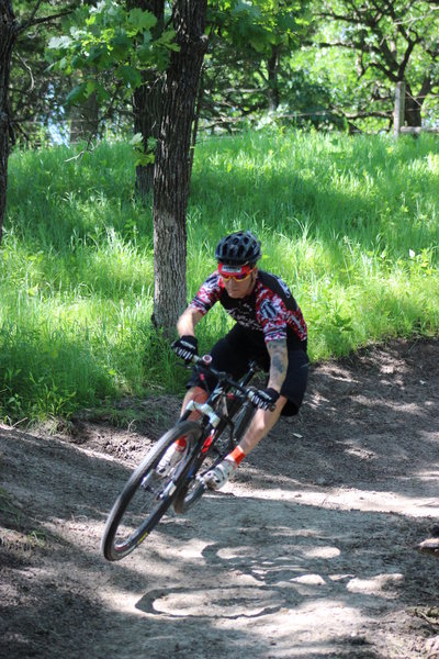 A rider finds air on the Long Creek Trail (taken shortly after construction).