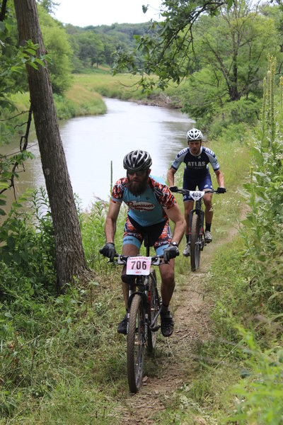 A pair of riders ascends the Riverside Trail in earnest at the 2016 Liberty Bell Cup.