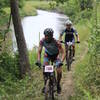 A pair of riders ascends the Riverside Trail in earnest at the 2016 Liberty Bell Cup.