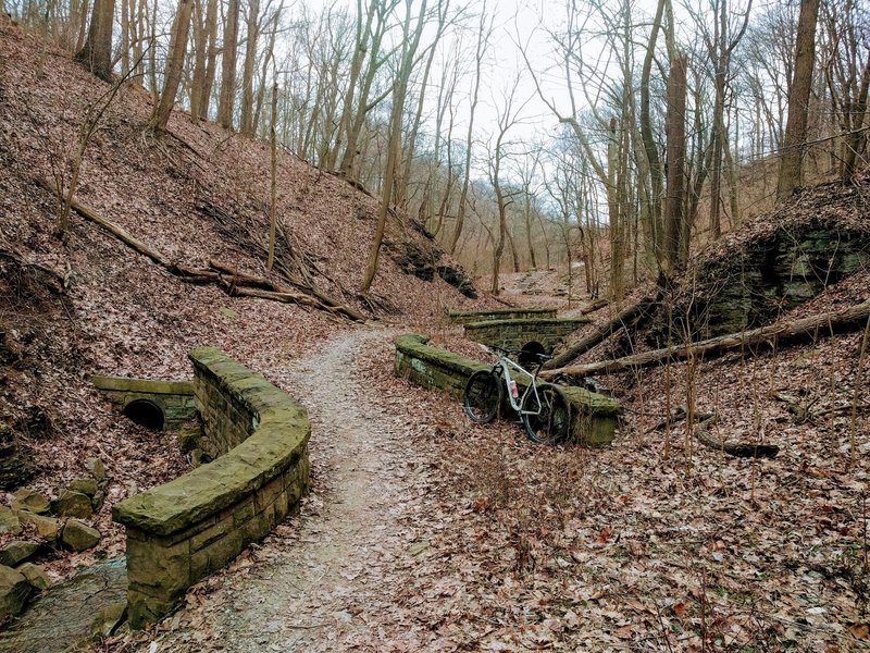 Beautiful stone bridges aid your passage on the easier, bottom part of the trail.