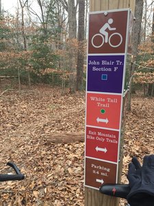 This sign marks the beginning of Section F off the White Tail Trail.