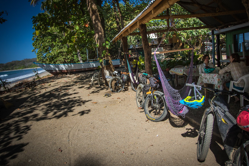 Enjoy a great little beach-side soda with hammock chairs and the best salchichon around at the Soda Playa Garza.