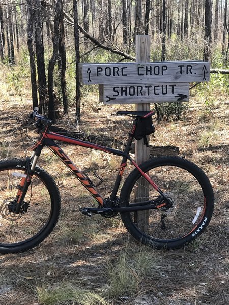 Keep your eyes peeled for this sign marking the shortcut off the Porc Chop Trail.