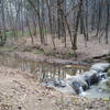 This is the rock dam from which this trail gets its name.