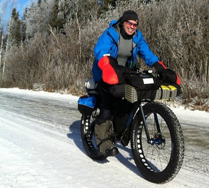 An ITI racer cruises by near Knik Lake.