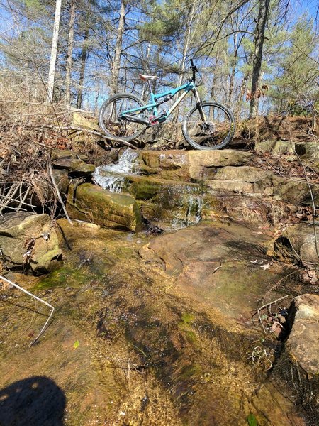 This creek waterfall near Audubon Lake makes for an interesting crossing!