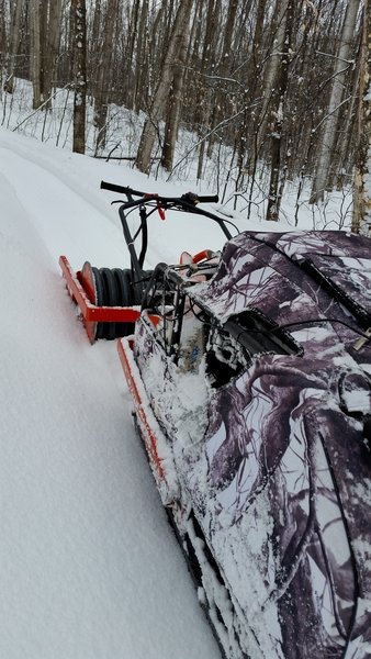 A singletrack groomer turns otherwise soft, awkward trails into great winter riding!
