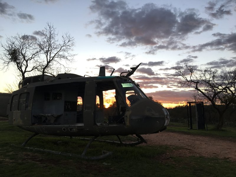 Ride faster....get to the choppa! This interesting military helicopter is located at the trailhead of Reveille Peak Ranch.