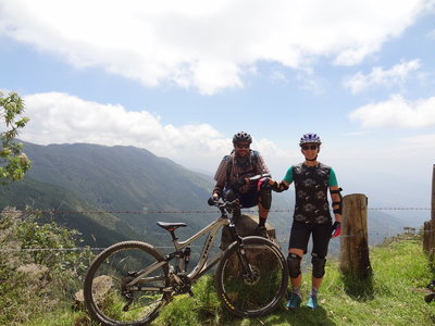 UnWise and the Lady pose for a photo. Don't fall off that stump!