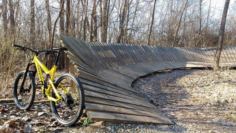 A wood berm helps you keep your speed along the Town Run Trail.