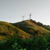 Towers stand in the distance along the South Ridge Trail.