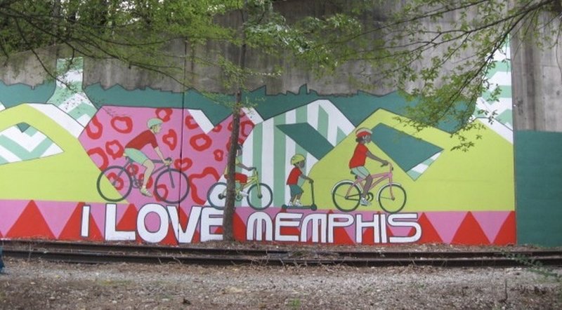 Take in the murals on the side of the trail.