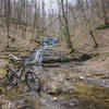 A waterfall awaits at the bottom of the Green Trail.