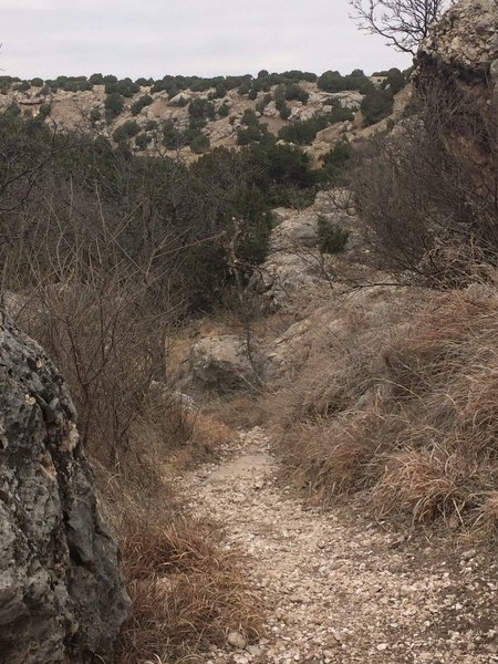 Navigate through the boulders of Quartz Rock Canyon.