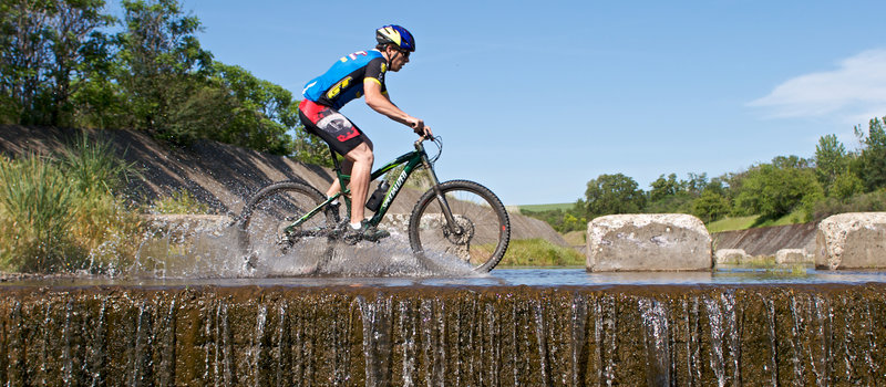 In the spring, the spillway canal on the Meadowlark Trail can make for a wet ride.