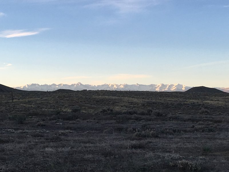 The San Juan Mountains guard the horizon from the Slanty Bridge Trail.