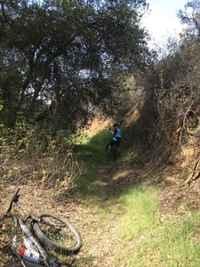 It's all smiles as we tackle some singletrack.