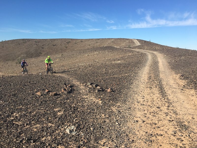 Ride through a moon-like landscape on the Sugarloaf Peak Trails.