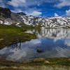 A solitary singletrack awaits around Lago Miserin.