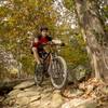 Concentration is needed hurtling down the rock feature toward the end of the trail.