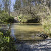 The ford over Shoal Creek is shallow enough to ride across, but you might get your knees wet if the water level is up.