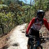 Robert takes a break along the wide benched trail.