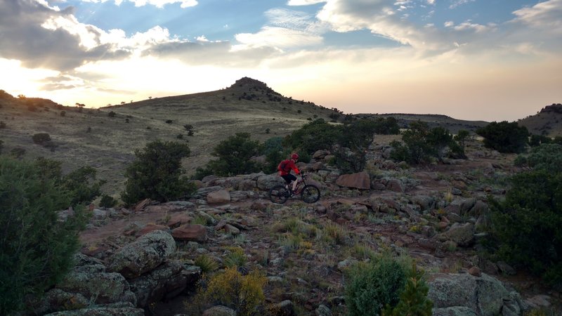 Climbing into the sunset on the Pronghorn Loop.