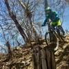 George tackles a rooty and rocky bit of trail.