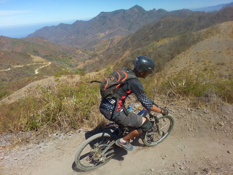 Distant mountains and fast dusty trails make for a great afternoon.