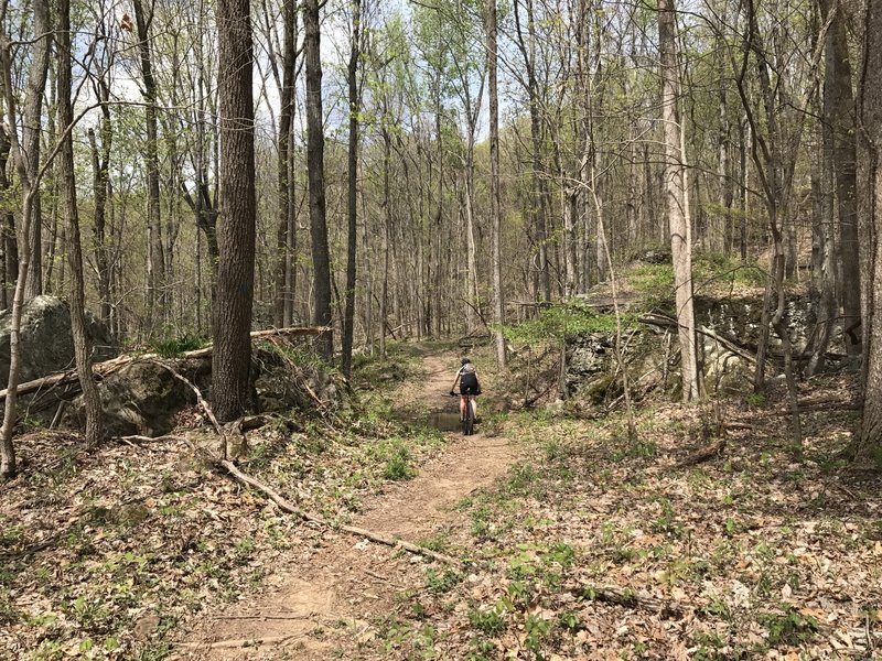 These large rock formations surround a small creek crossing.