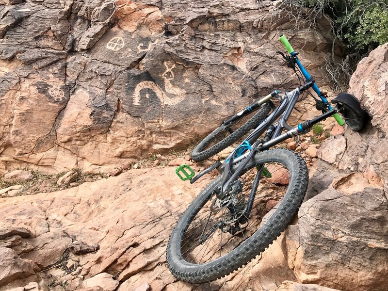 Astonishing view of nearby petroglyphs that can be found among the rocks in this area. Be sure to walk your bike carefully in this place and also make sure you do not disturb these precious windows into the past.