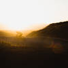 Nick hits one of the large berms on the "Black Line" on the Sunset Trails in Erie, CO