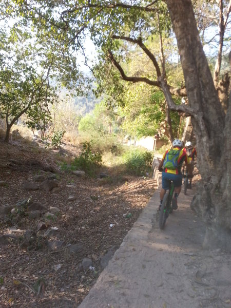 Riding back into town along the river bed.